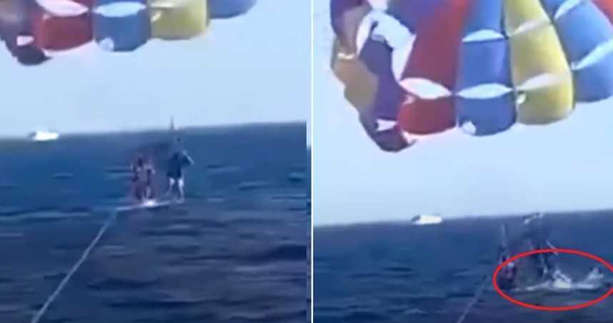 一名男子上週五在紅海阿喀巴港（Aqaba）處玩滑翔傘慘被鯊魚咬斷腿。（翻攝自youtube）