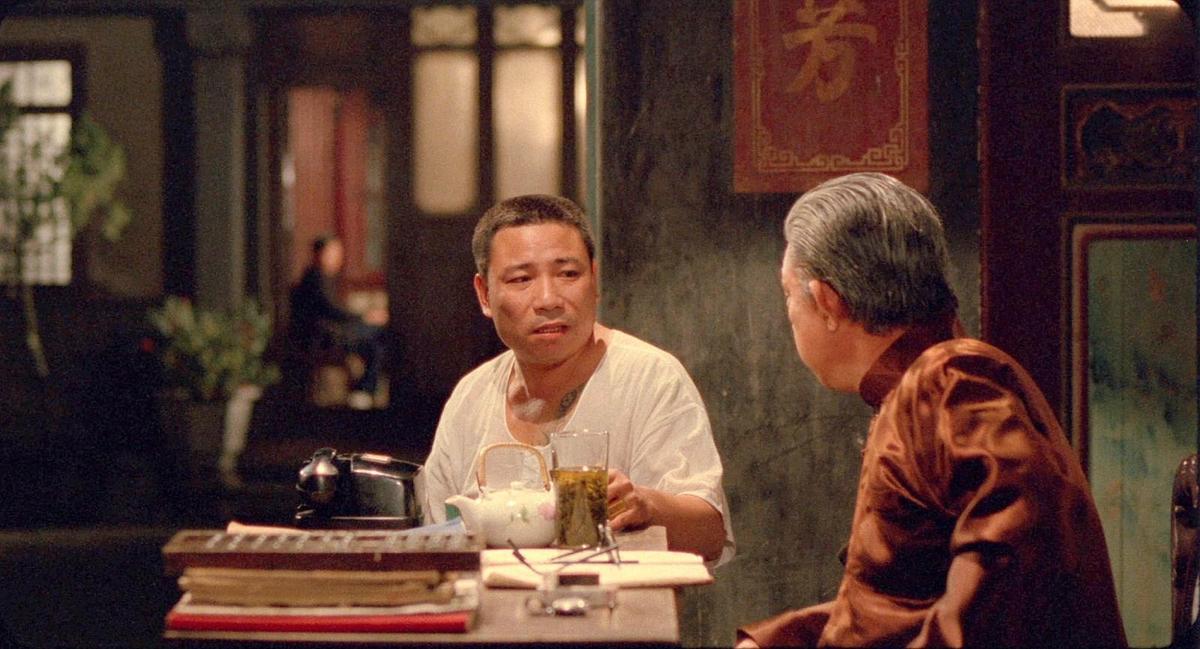 陳松勇（左）原在《悲情城市》的戲份只是配角，卻榮登金馬影帝。（翻攝自國家電影中心官網）