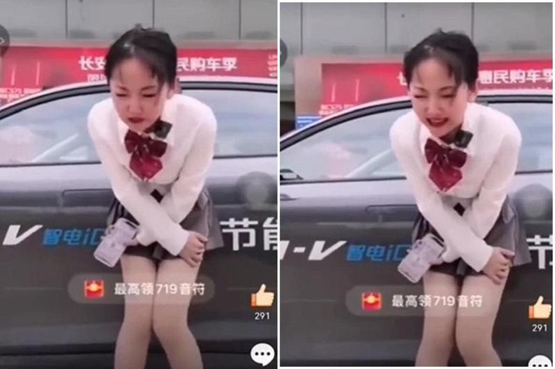 中國妹子直播賣車，表情超痛苦！網驚喊「電麻了」。（翻自微博）